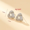 Silver tone heart shaped stud earrings featuring pavé cubic zirconia settings - Silver Geometric Interwoven Style