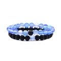 Detailed view of matte black and translucent blue natural stone beaded bracelets set - Matte Black + Blue Moonlight Stone