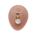 Close-up of golden heart navel ring with sparkling zircons worn on a model's navel - Gold Rhinestone Heart