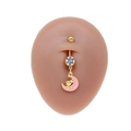 Macro shot of gold belly ring with pink moon pendant and rabbit detail on model - Gold Pink Moon Rabbit