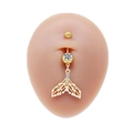 Golden belly button ring with star, moon and mermaid tail pendant on a navel model - Gold Mermaid Tail