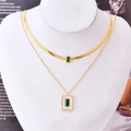Double-layered gold necklace set with green zircon and square shell pendants on magazine background - Gold Necklace (B407)