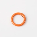 Detailed view of an orange round metal spring ring buckle for keychains and accessories - Orange (Outer Diameter 23mm)