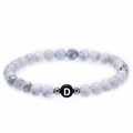 Elastic 6mm white turquoise beaded bracelet featuring a black letter D bead with silver spacers - Letter D Bracelet