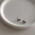 Polished silver bean stud earrings for women on a white minimalist ceramic tray - Style 3004 / Silver