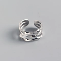 Close-up of S925 sterling silver triple-layer twisted ring with adjustable open design - 925 Silver / White Gold