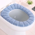Universal light blue knitted toilet seat cover with thick plush texture for winter warmth - Nordic Blue