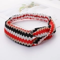 Criss-cross elastic headband featuring red, black, and beige wavy pattern for women - Small Red Plaid