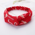 Twisted fabric headband featuring red flamingo print for sports and makeup use - Red Flamingo