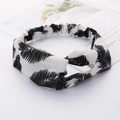 Crossed cloth headband featuring black leaf pattern design for women stylish hair accessory - White Feather