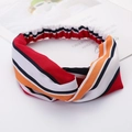 Women's cross knot headband with vibrant red and orange striped pattern and elastic band - Style 71 Colorful Stripes