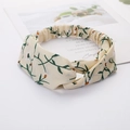 Cross-knot hairband featuring beige fabric with green leaves and white floral patterns - Style 52 Beige Leaf