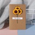 Detailed view of handmade kraft paper card with yellow artificial sunflowers and text - Sunflower - Kraft Card