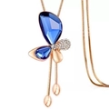 Rose gold butterfly pendant necklace featuring dark blue crystals and diamonds - Gold + Royal Blue