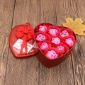 Detail of a heart-shaped tin box featuring nine soap roses with a romantic gift card - 9 Large Heart Tin Flowers (Red)