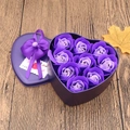 Macro shot of 9 purple soap roses in a heart-shaped tin with a silk bow and Love card - 9 Large Heart Tin Flowers (Purple)