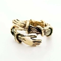 Detail of antique gold hug ring showing retro texture and adjustable wrap design - Style 004 / Antique Gold