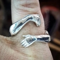 Adjustable silver hugging hands ring featuring a creative embrace design for men and women - Style 002 / Antique Silver