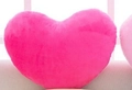 Plush heart-shaped pillow in vibrant pink color for romantic gifts and home decor - Rose Pink