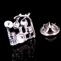 Detailed view of a silver drum kit brooch pin with a butterfly clutch back closure - Silver Drum Kit