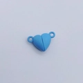 Macro detail of blue heart shaped magnetic jewelry clasps with round connector rings - Heart / Light Blue