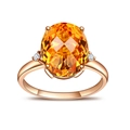 Elegante anello in oro rosa con grande pietra preziosa gialla ovale e diamanti bianchi - Anello