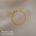 Detail of golden leaf texture bracelet with adjustable chain on textured fabric background - S509 Wheat Style / Gold