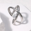 Minimalist silver crossover adjustable titanium steel ring on a white stone background - Adjustable / Steel