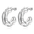 Close-up of silver C-shaped titanium earrings with inlaid white pearls on white background - Steel Color Pearl