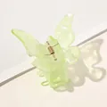 Close-up of butterfly hair claw in iridescent green acetate with gold spring mechanism - Fresh Green Butterfly Claw