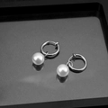 Elegant silver stainless steel hoop earrings with round white pearl pendants for women - Clip-On Earrings / 10MM Pearl Pair / Silver/White
