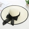 Chic cream straw sun hat with black bow ribbon and wide brim for summer beach vacation - M (56-58cm) / Cream