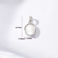 Macro shot of oval white shell pendant in silver showing 18.7mm height and 9.5mm width details - H-11063 Oval