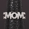 Macro shot of silver MOM letter ring with pavé sparkling crystals on a black stand - Adjustable Open / Platinum Color (MOM Style)