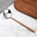 Modern SUS 304 stainless steel soup spoon with a long beech wood handle on marble background - Soup Spoon / Silver