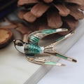 Exquisite enamel swallow bird brooch with crystals on vintage book background - Spring Swallow