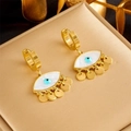 Gouden Evil Eye hangorbellen met ronde paillettenkwastjes op een juwelendoosje - Goud