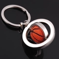 Rotating basketball keychain with silver metal frame and orange textured ball pendant - Rotating Basketball