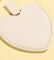Cream heart-shaped stainless steel mirror in a textured leather case with strap - White