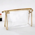 Transparent PVC makeup bag with gold trim and zipper closure for waterproof storage - Large / Gold