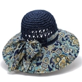 Close-up of navy straw sun hat with paisley print wide brim and decorative bow detail - M (56-58cm) / Navy Blue (Small Flower)