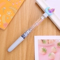 Cute liquid quicksand gel pen featuring purple unicorn and moon charms on wood surface - Quicksand Moon Unicorn Pen Blue