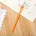 Creative orange cartoon gel pen with silicone fruit topper on a school desk background - Orange Gel Pen