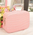 Pink faux crocodile pattern makeup box with metal handle and dual zipper closure - Pink
