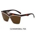 Modische Cat-Eye-Sonnenbrille mit Schildpatt-Rahmen, Tee-Gläsern und silbernem V-Dekor - Schildpatt Rahmen Tee Gläser