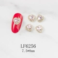 Detail of pink crystal heart nail charms with rhinestones and 7.5x8mm size label - Pink Heart Gold Base (6256)