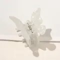 Close-up of pearl white butterfly hair claw with iridescent finish and silver metal spring - Fairy White Butterfly Claw