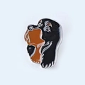 Macro detail of enamel dog head brooch with bone-shaped mouth and metallic edges - 11-Rottweiler with Bone
