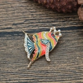 Detail of tropical fish brooch with colorful enamel stripes, pearls, and rhinestones - Red Yellow Green Blue Striped