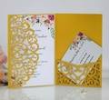 Elegant gold laser-cut wedding invitation set with floral card and RSVP on white background - Gold
